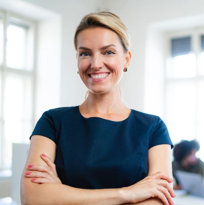 2-portrait-of-confident-woman-voter-in-polling-place-PUKYPXS.jpg